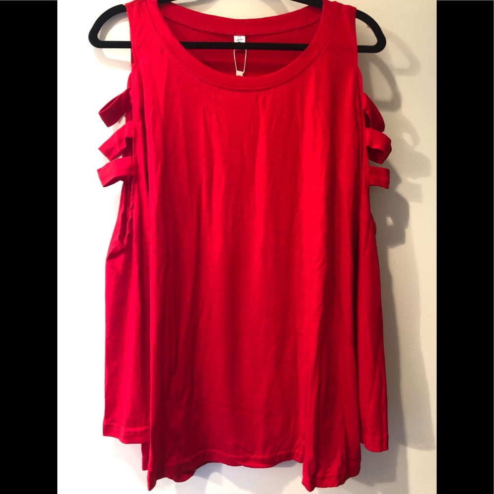 Sexy long sleeve top w/shoulder & sleeve cut-outs, comfy & versatile